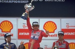 INTERLAGOS (BRASILE) 24-03-1991-AYRTON SENNA ALZA IL TROFEO DELLA VITTORIA TRA RICCARDO PATRESE E GERHARD BERGER. E' LA PRIMA VOLTA CHE IL PILOTA BRASILIANO VINCE DAVANTI AI SUOI TIFOSI. © FOTO ERCOLE COLOMBO